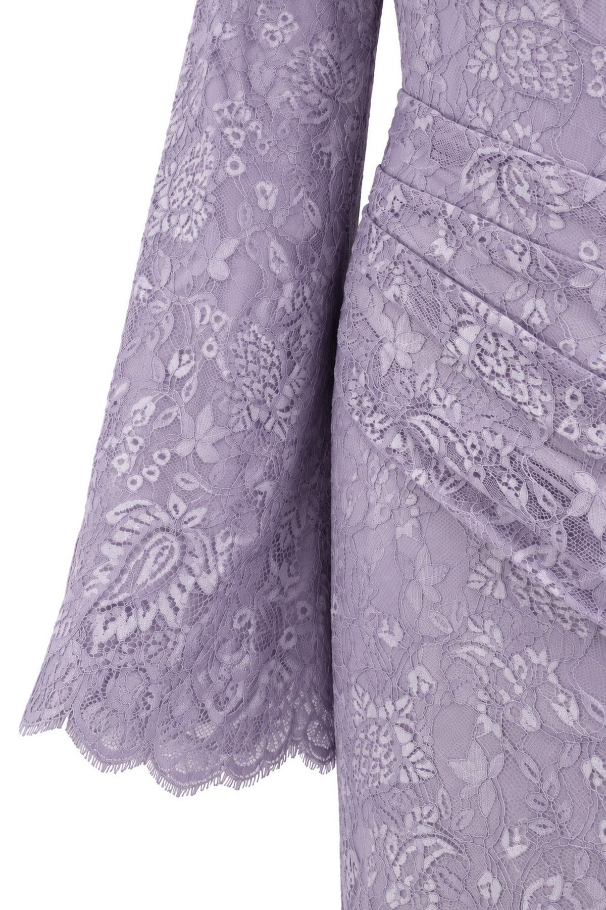 Close-up of the Lilia lilac dress, showing floral lace and the scalloped edge of a long sleeve.