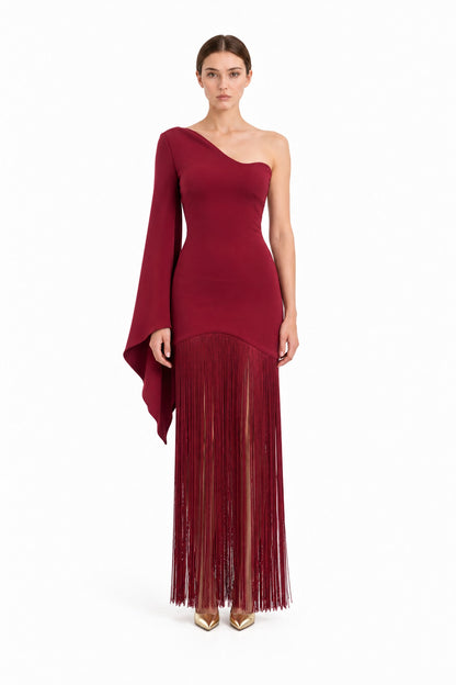 APERLAMIRI Seraphine burgundy one-shoulder cape-sleeve fringe maxi dress — front view